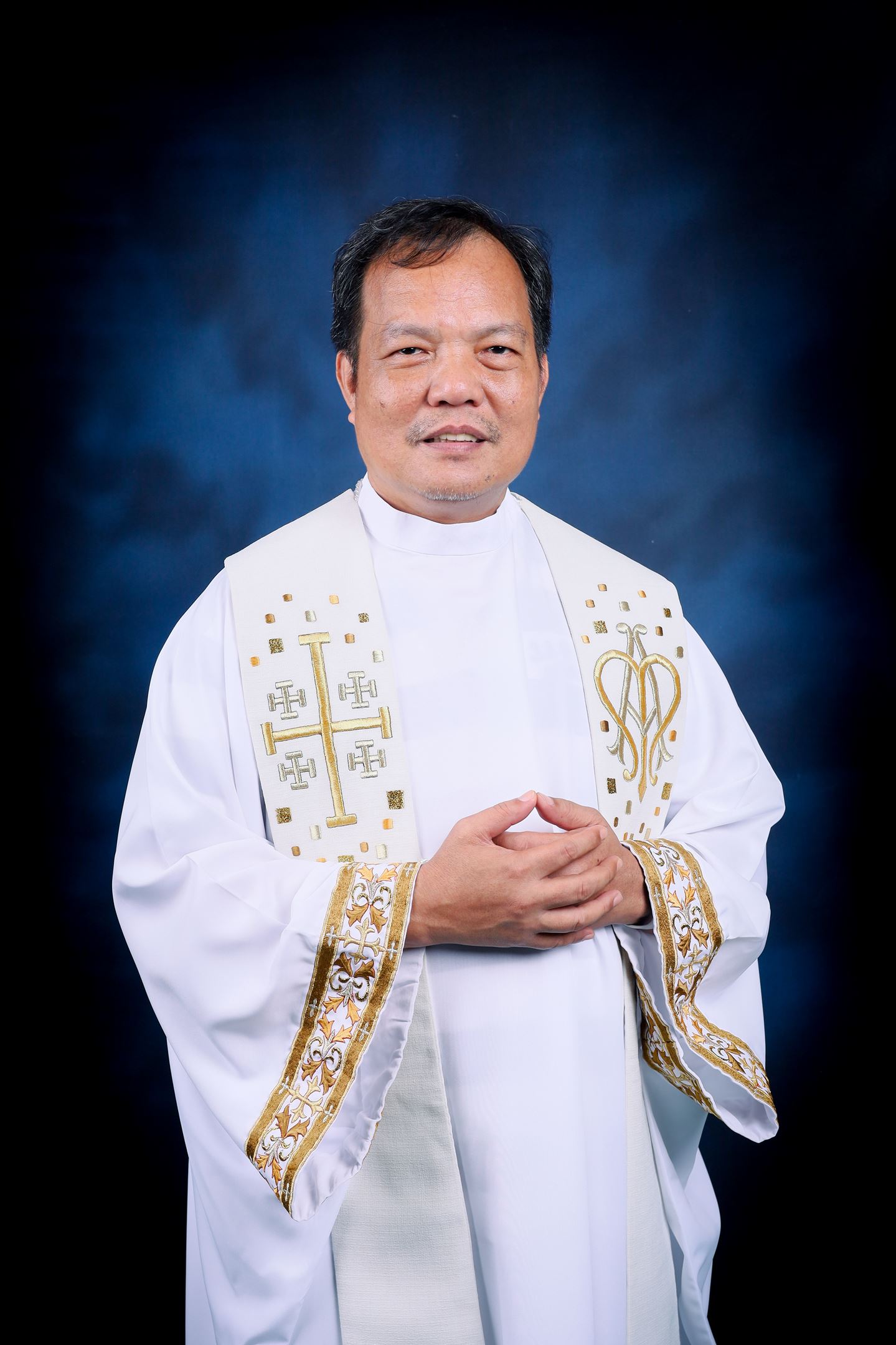 Fr. Reuel D. Castañeda '67 (B)